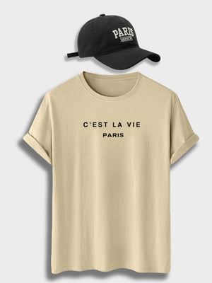 Sand-coloured shirt with black cap